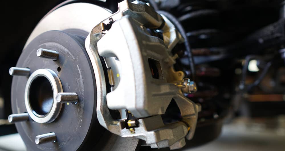 8 Symptoms Of A Bad Brake Caliper (& Replacement Cost)