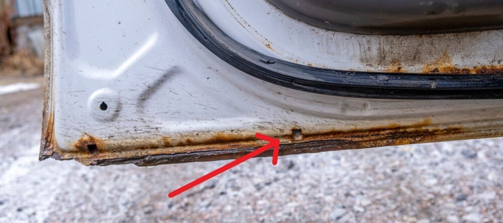 car door drain location