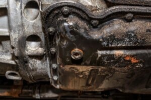 5 Symptoms Of A Leaking Oil Pan Gasket & Replacement Cost