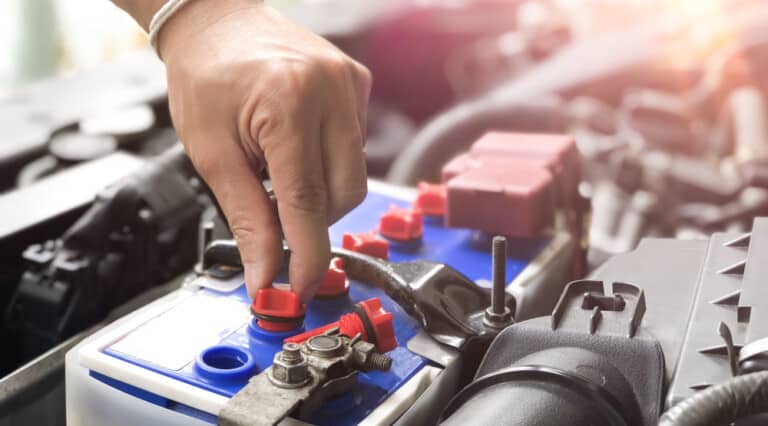 How do you recondition a sealed car battery