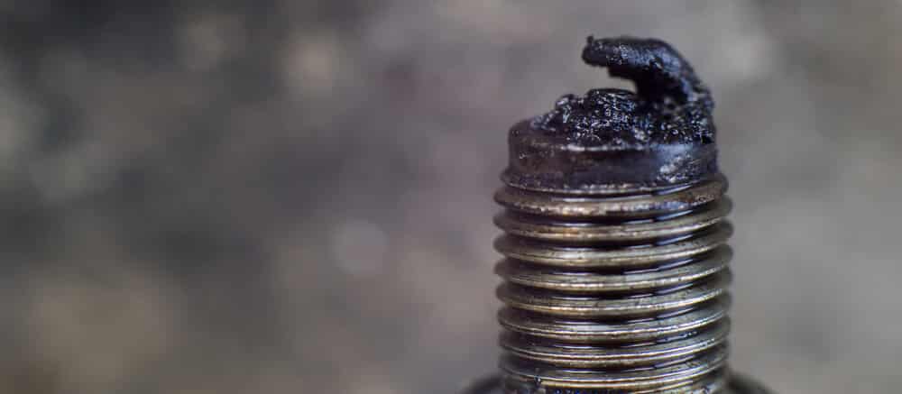 oil spark plug