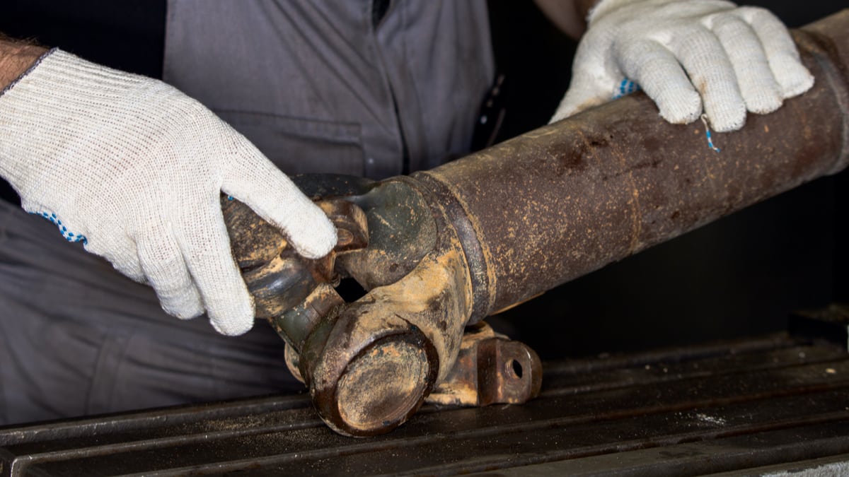 5 Symptoms Of A Bad Driveshaft (& Replacement Cost)