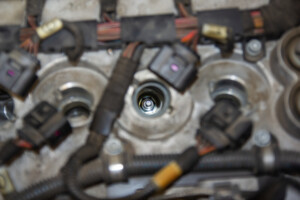 7 Symptoms Of Bad Spark Plugs & Replacement Cost
