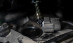7 Symptoms Of Bad Spark Plugs & Replacement Cost