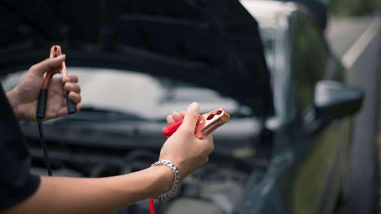 jump start a car in the rain