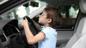 Young Driver In Car
