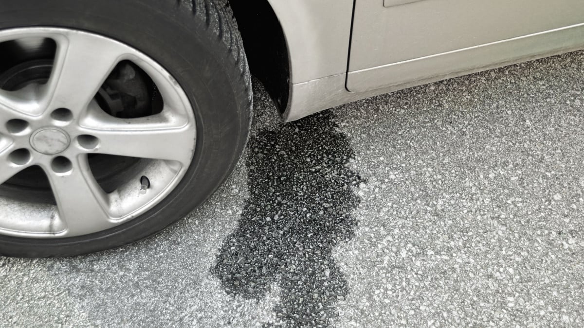 Water leaking under car