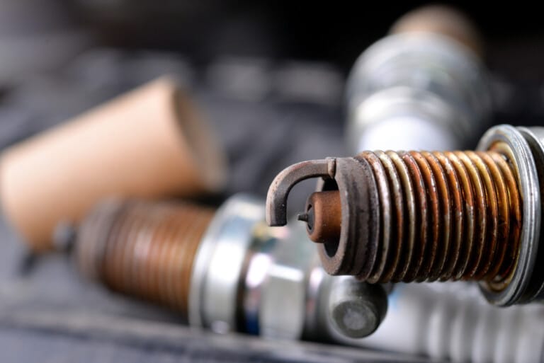 What Does White Spark Plug Tips Mean?